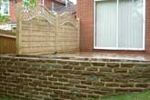 Brick retaining wall and patio